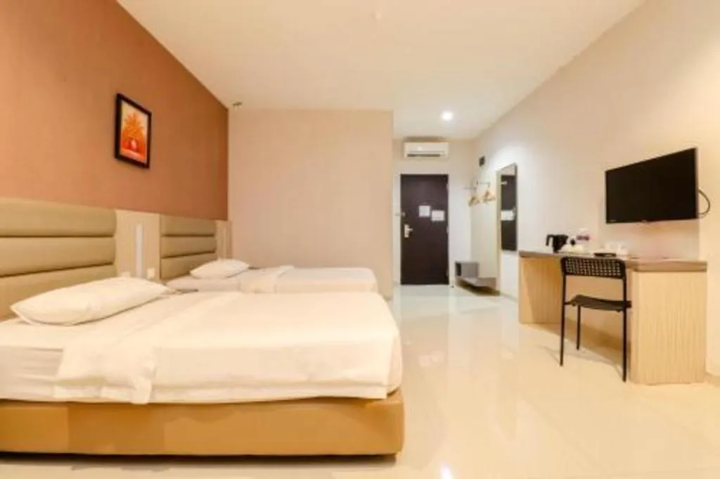 Bed in Lovina Inn Hotel Batam