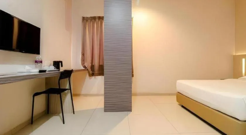 Bed in Lovina Inn Hotel Batam