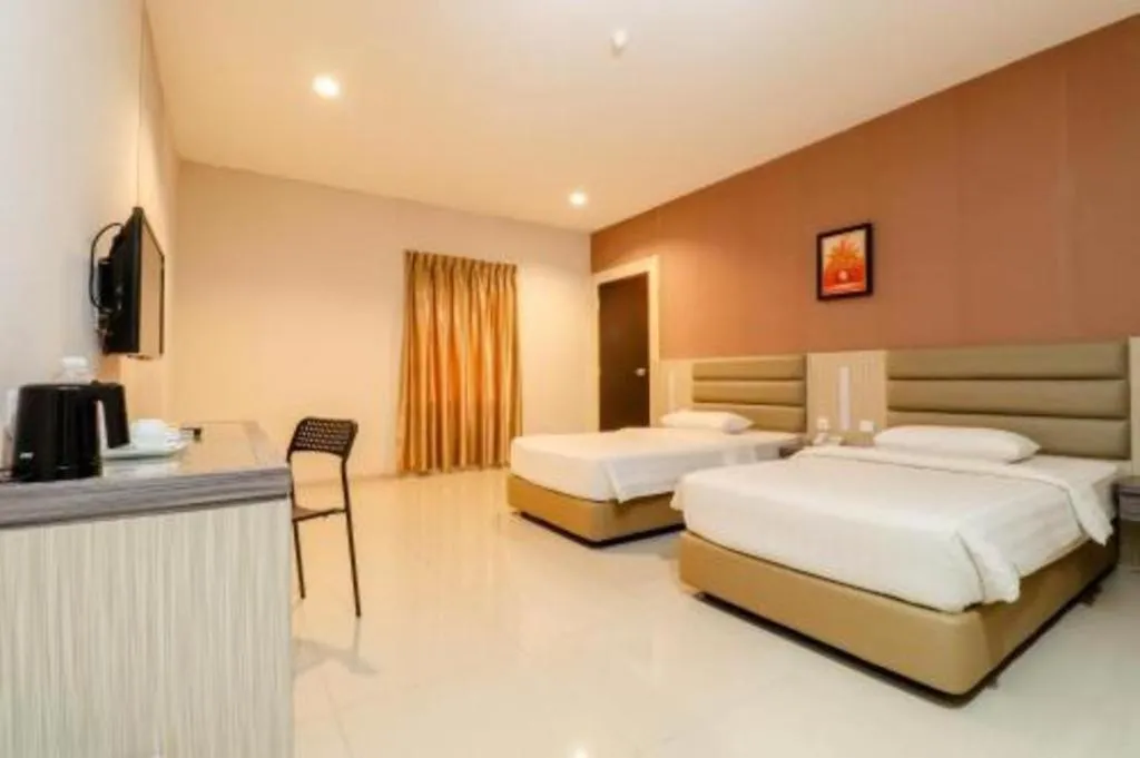 Bed in Lovina Inn Hotel Batam