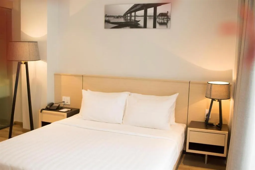 Bed in Lavender Boutique Hotel