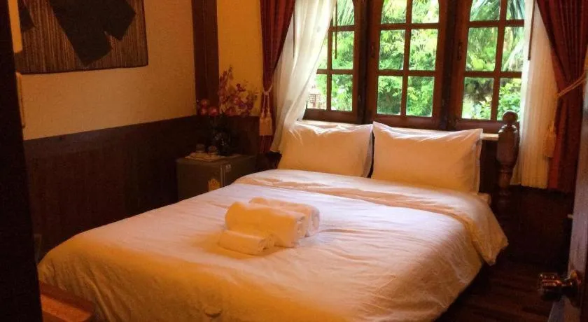 Bed in Himawari Restaurant and Cottage