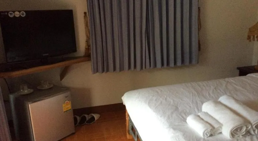 Bed in Himawari Restaurant and Cottage