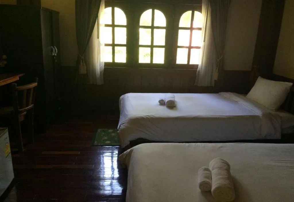 Bed in Himawari Restaurant and Cottage