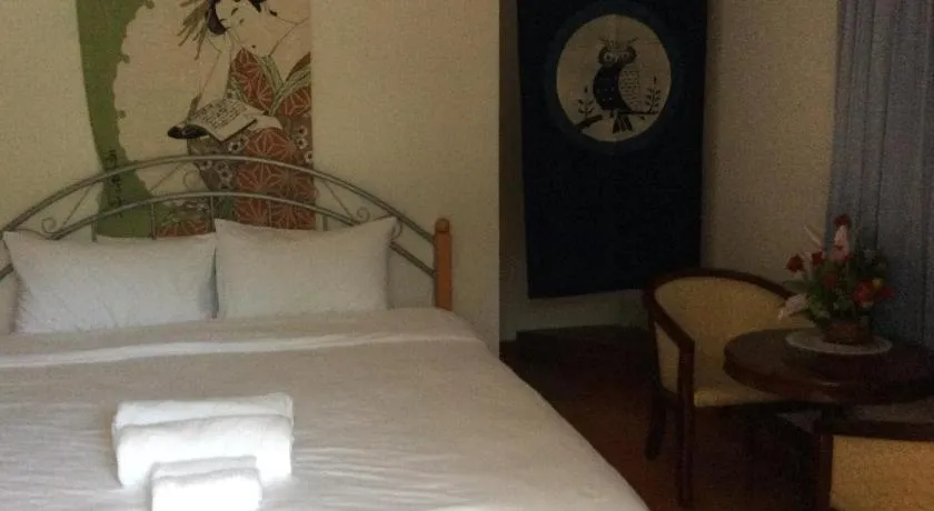 Bed in Himawari Restaurant and Cottage