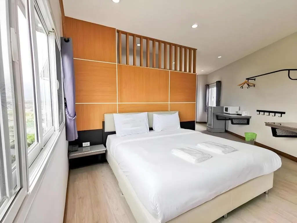 Bed in The Y Residence