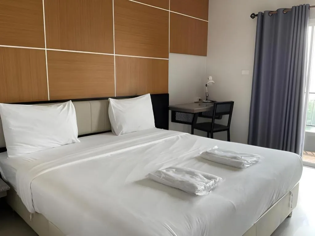 Bed in The Y Residence