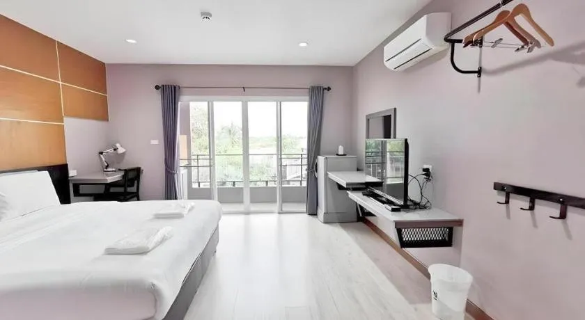 Bed in The Y Residence