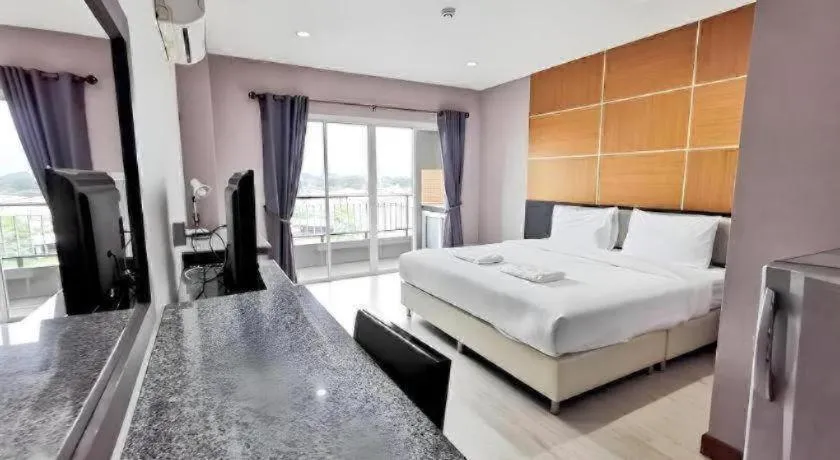 Bed in The Y Residence