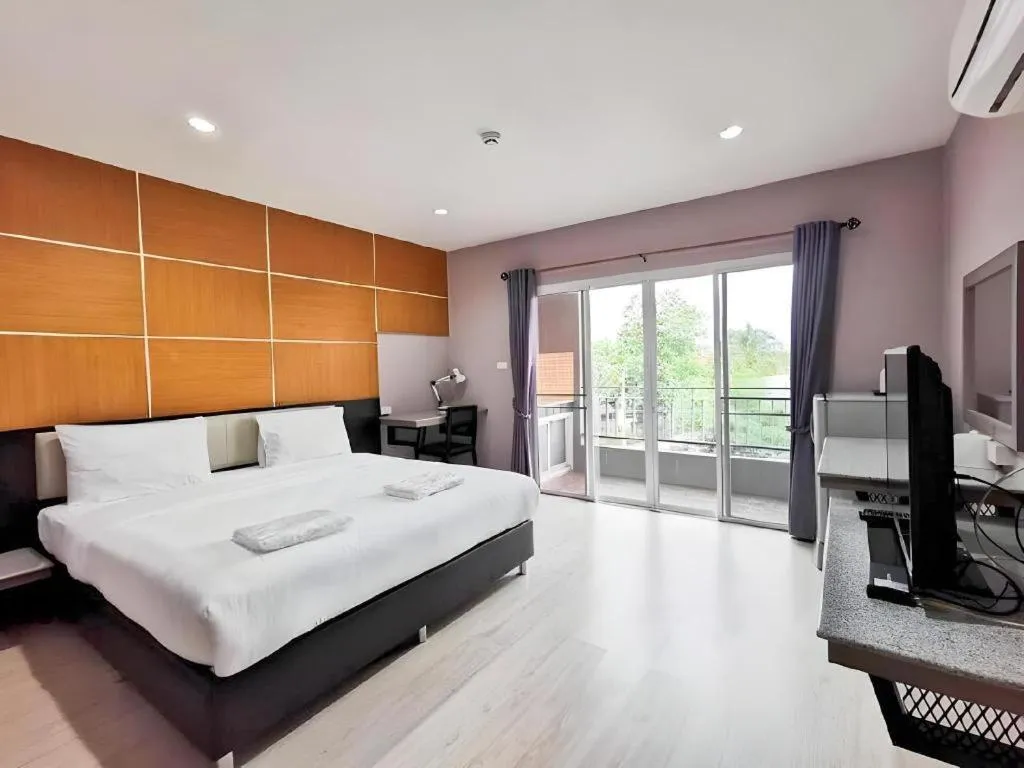 Bed in The Y Residence