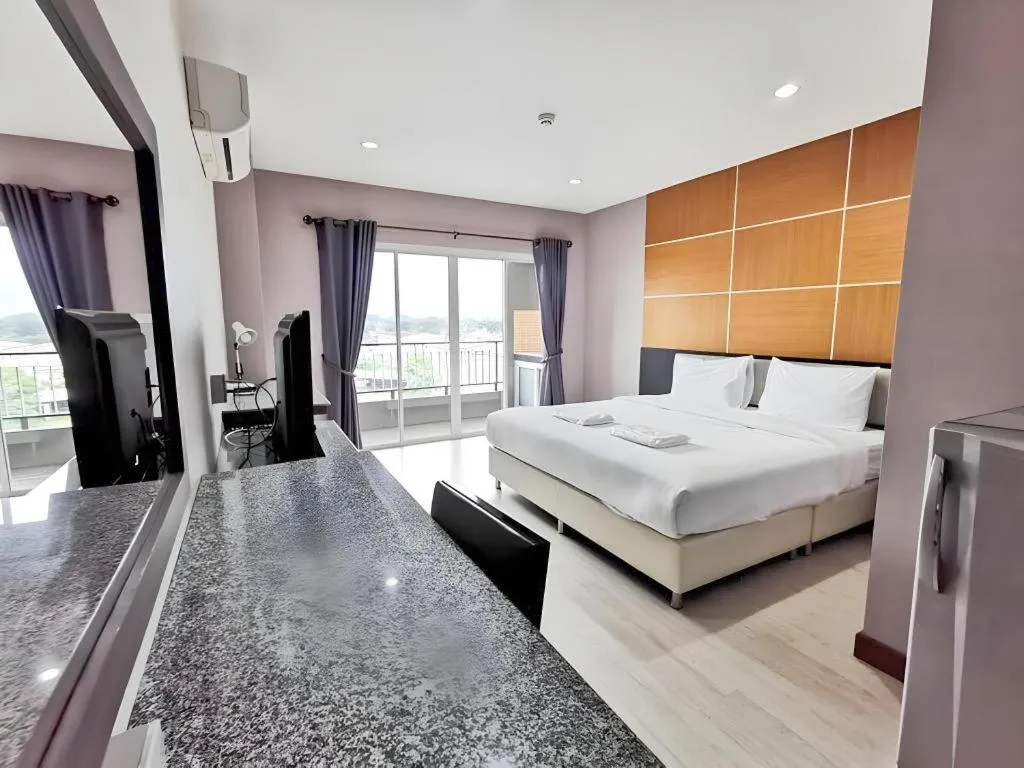 Bed in The Y Residence