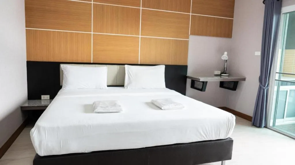 Bed in The Y Residence