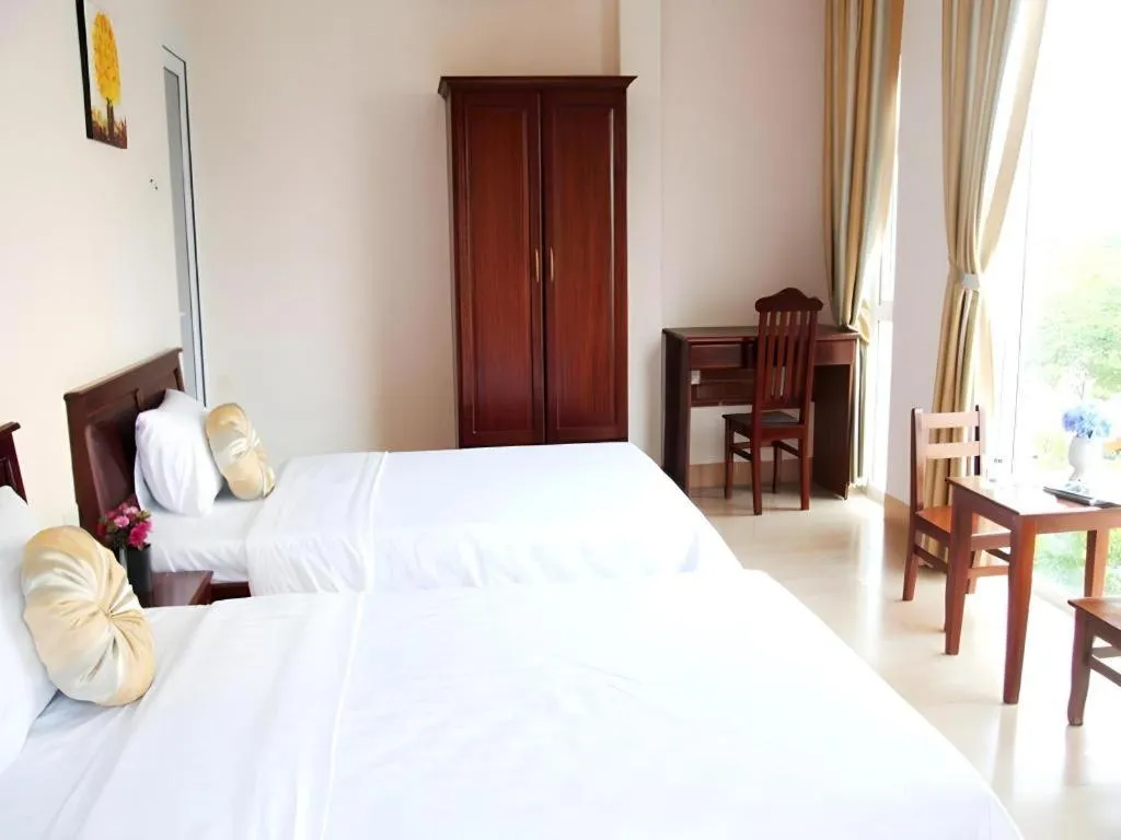 Bed in Huong Binh Hotel