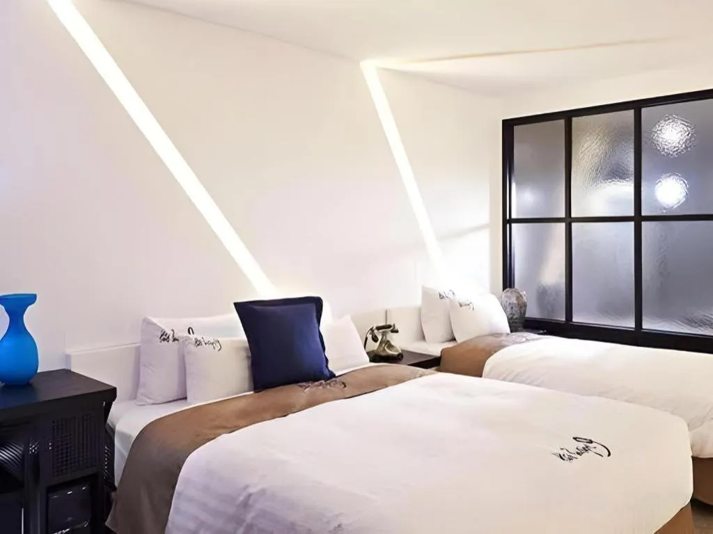 Bed in Hotel Boutique 9