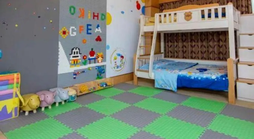 Bed in Zhuhai Dehan Hotel