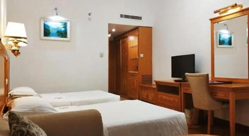 Bed in Zhuhai Dehan Hotel