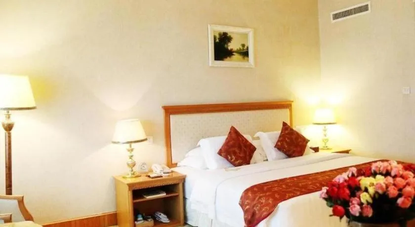 Bed in Zhuhai Dehan Hotel
