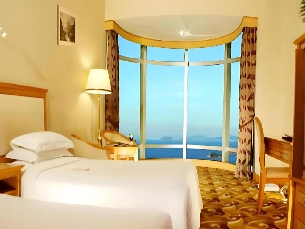 Bed in Zhuhai Dehan Hotel