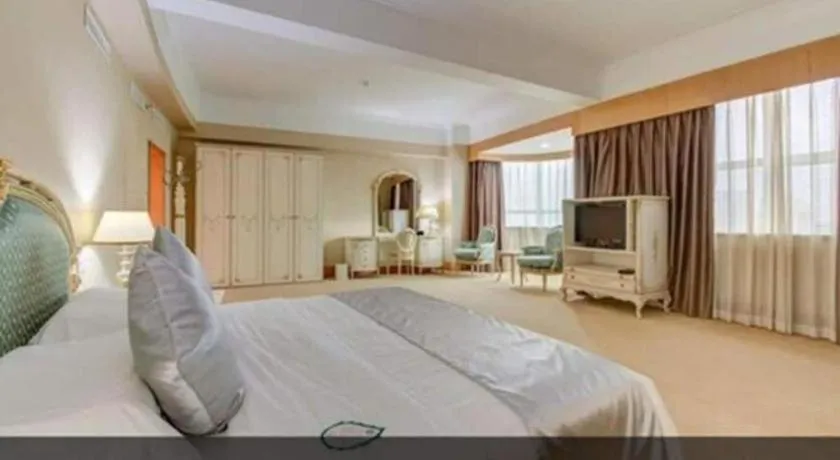 Bed in Zhuhai Dehan Hotel