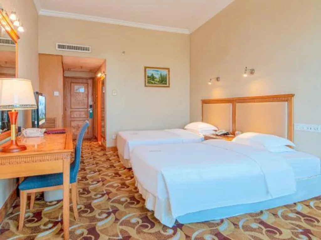 Bed in Zhuhai Dehan Hotel