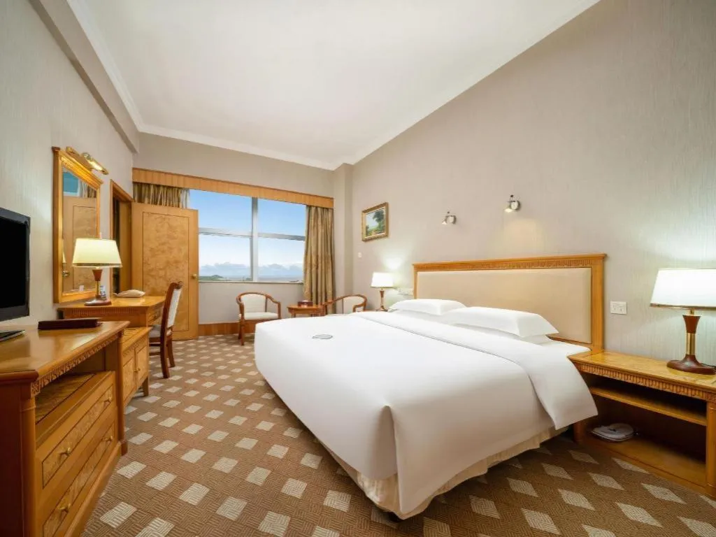 Bed in Zhuhai Dehan Hotel