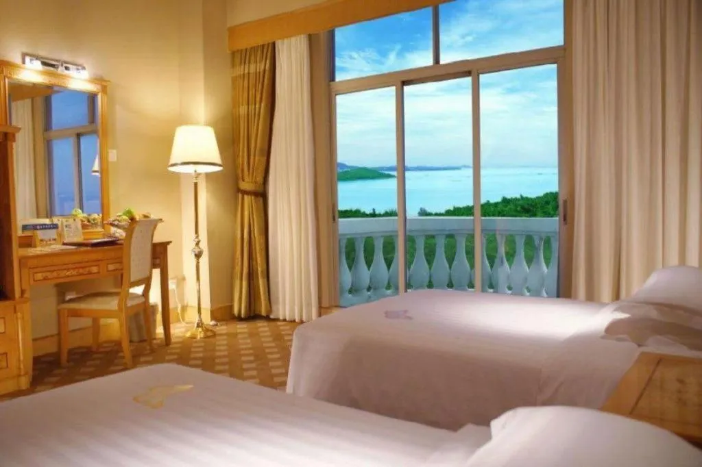 Bed in Zhuhai Dehan Hotel