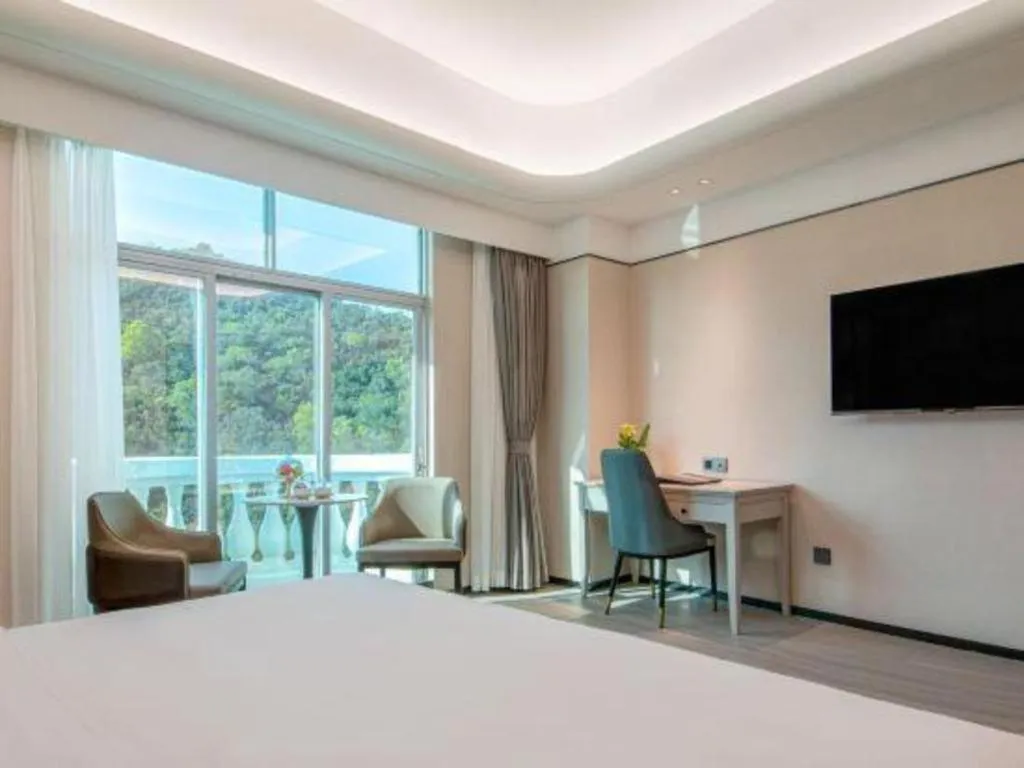 Bed in Zhuhai Dehan Hotel