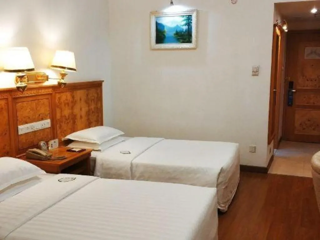 Bed in Zhuhai Dehan Hotel