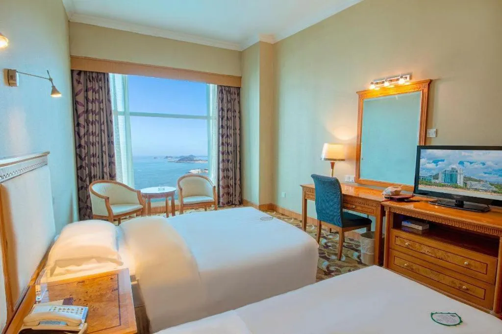 Bed in Zhuhai Dehan Hotel