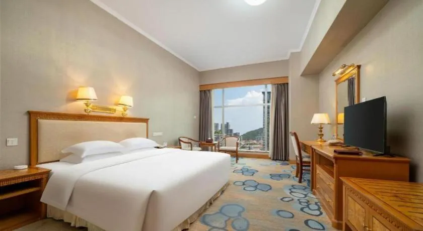 Bed in Zhuhai Dehan Hotel