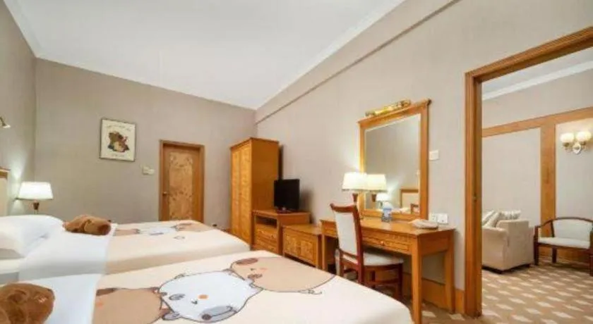 Bed in Zhuhai Dehan Hotel