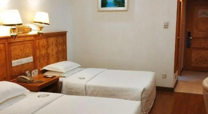 Bed in Zhuhai Dehan Hotel