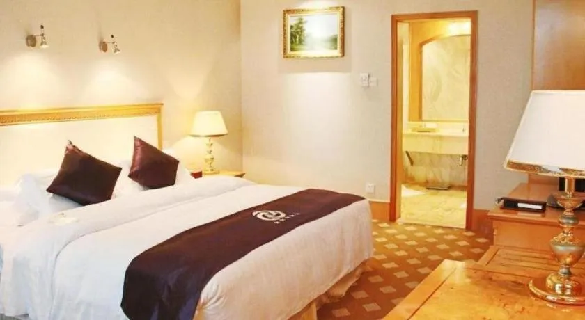 Bed in Zhuhai Dehan Hotel