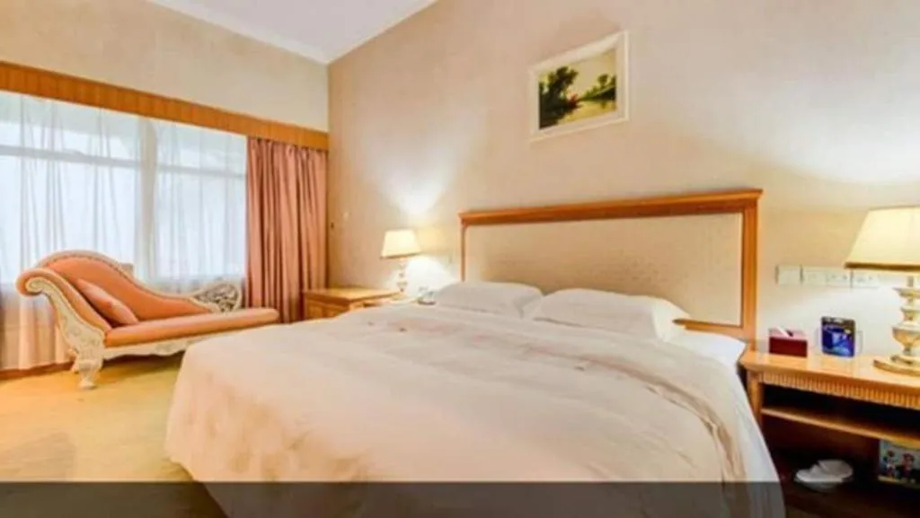 Bed in Zhuhai Dehan Hotel