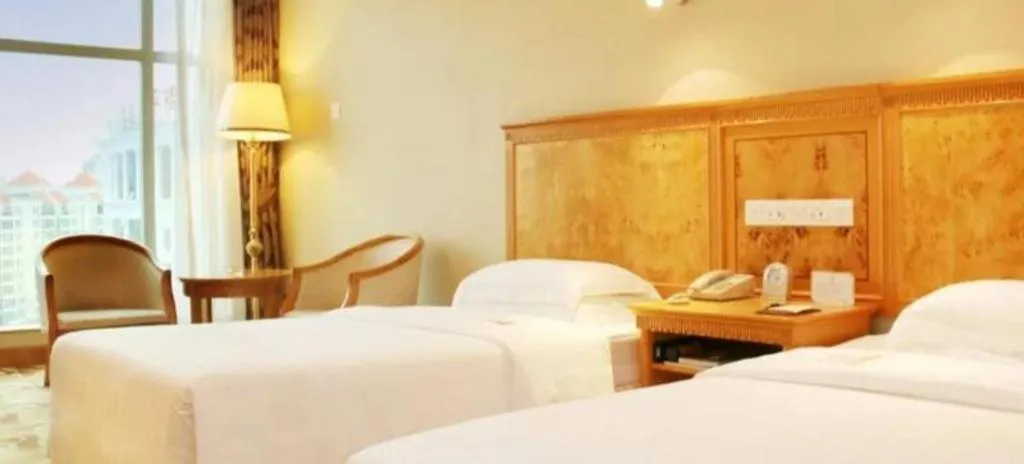 Bed in Zhuhai Dehan Hotel