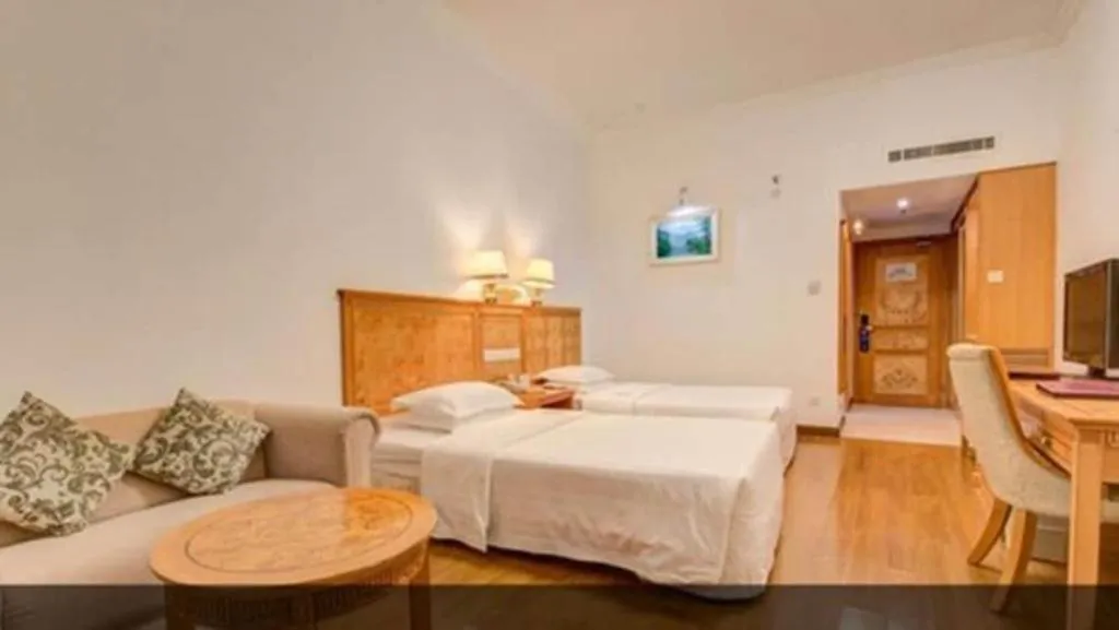 Bed in Zhuhai Dehan Hotel