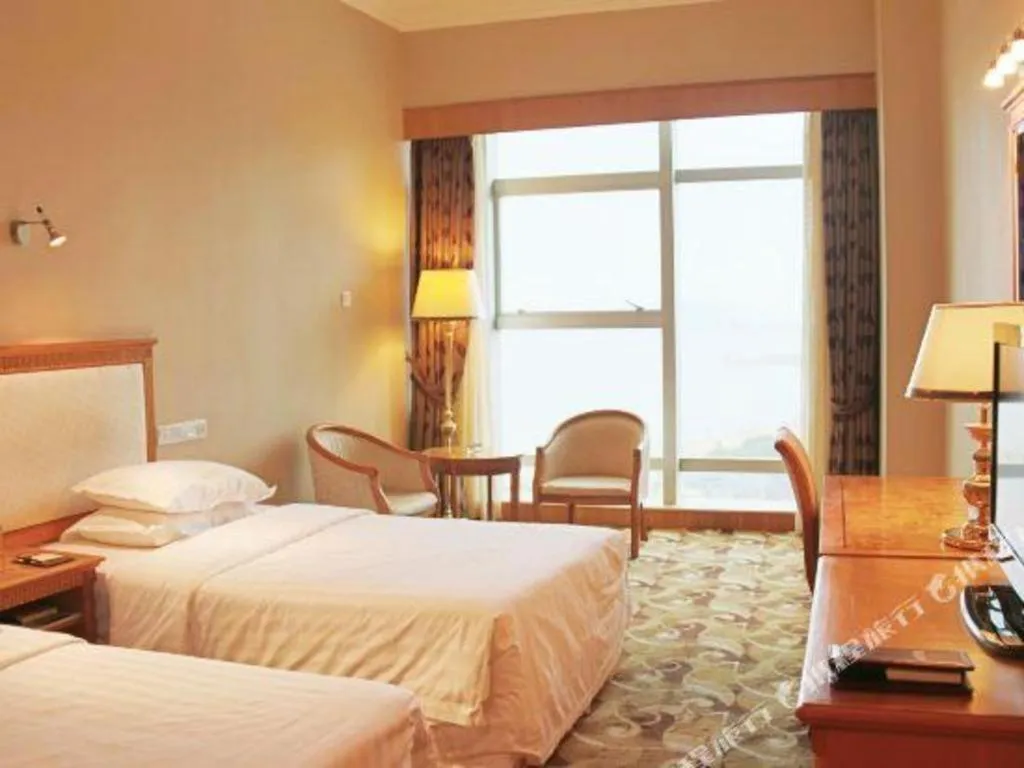 Bed in Zhuhai Dehan Hotel