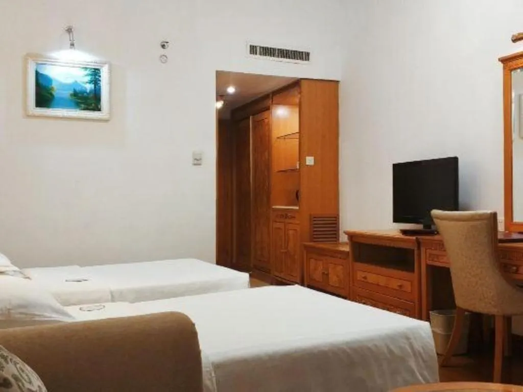 Bed in Zhuhai Dehan Hotel