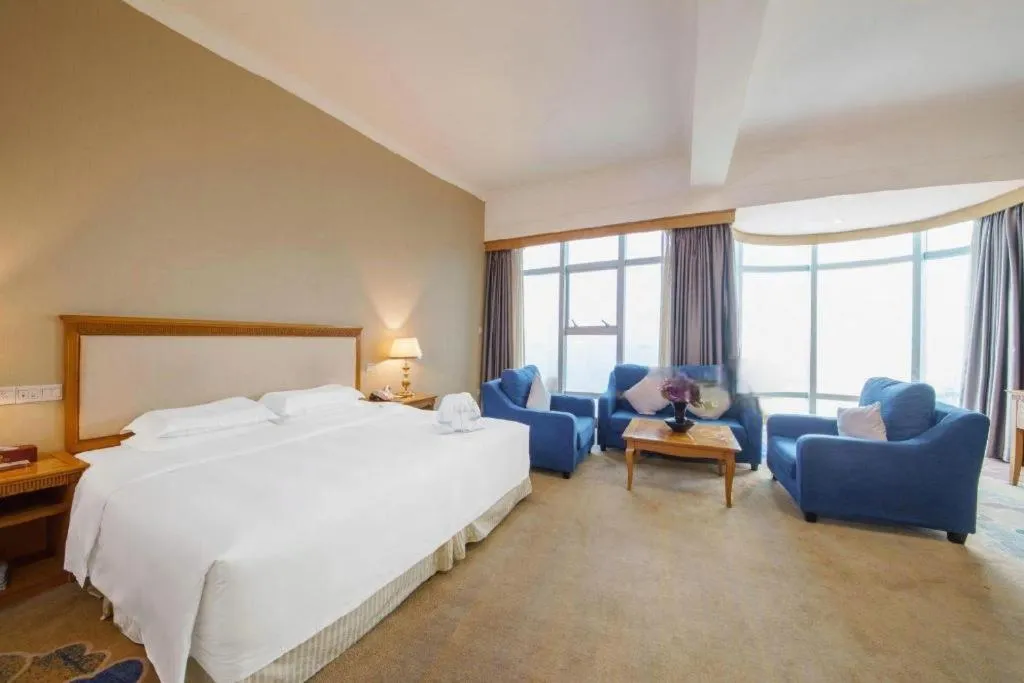 Bed in Zhuhai Dehan Hotel