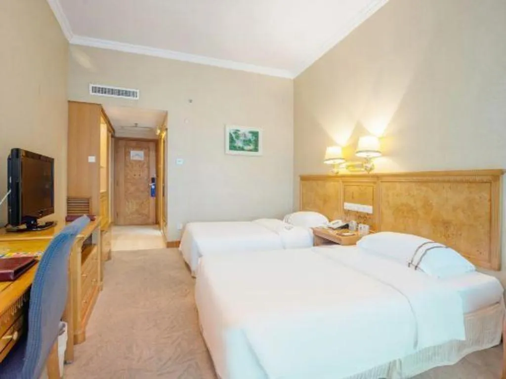 Bed in Zhuhai Dehan Hotel
