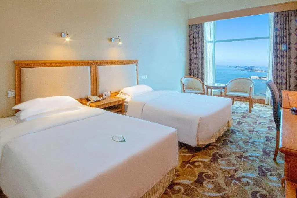 Bed in Zhuhai Dehan Hotel