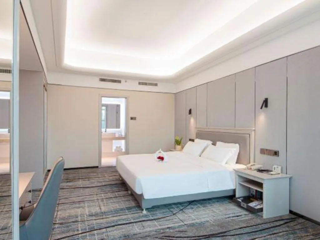 Bed in Zhuhai Dehan Hotel