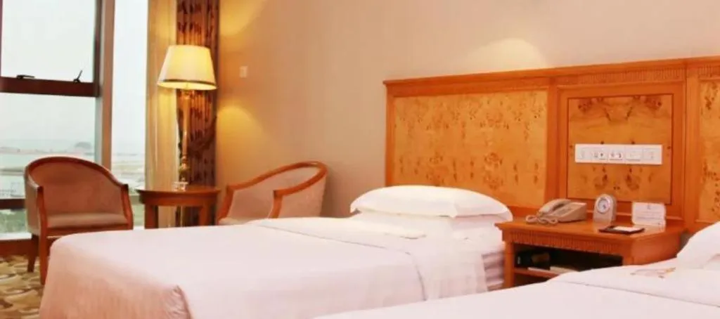 Bed in Zhuhai Dehan Hotel