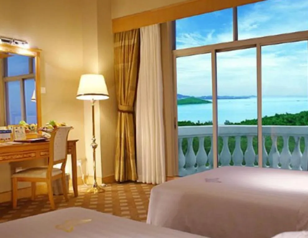 Bed in Zhuhai Dehan Hotel