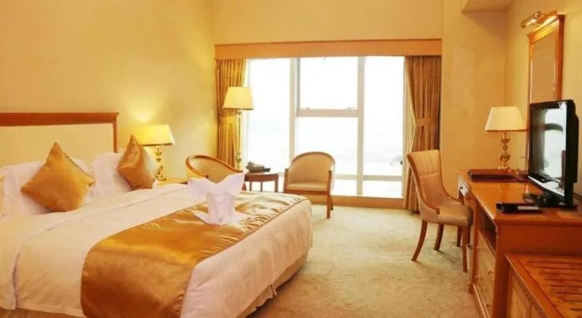 Bed in Zhuhai Dehan Hotel