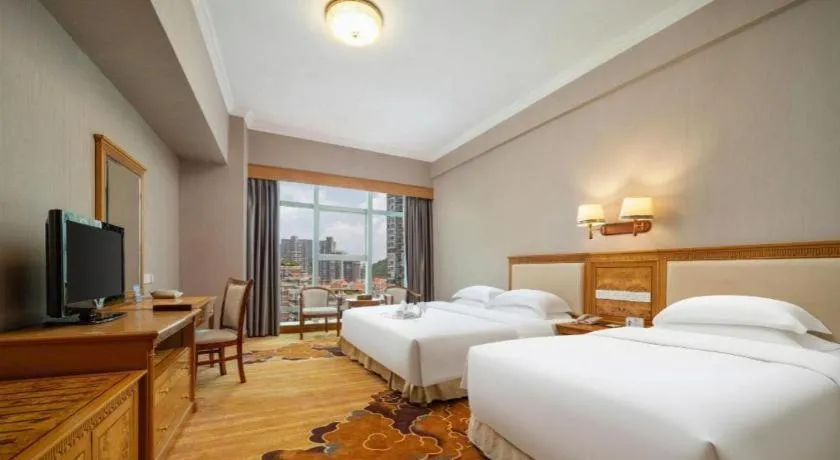 Bed in Zhuhai Dehan Hotel