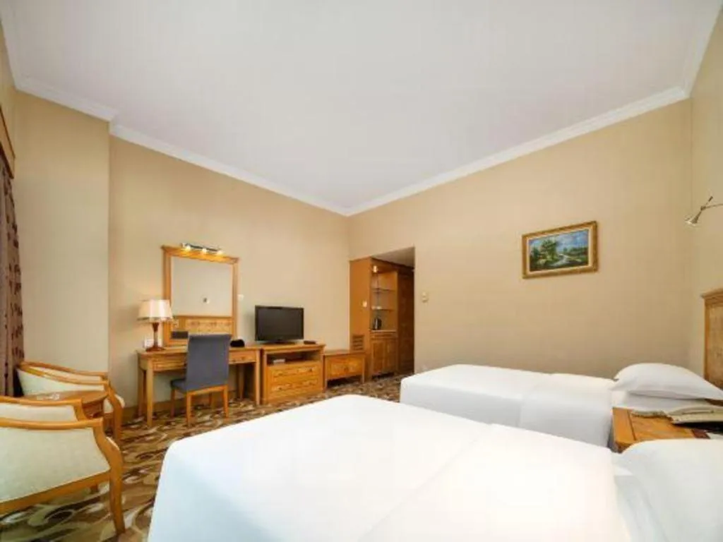 Bed in Zhuhai Dehan Hotel