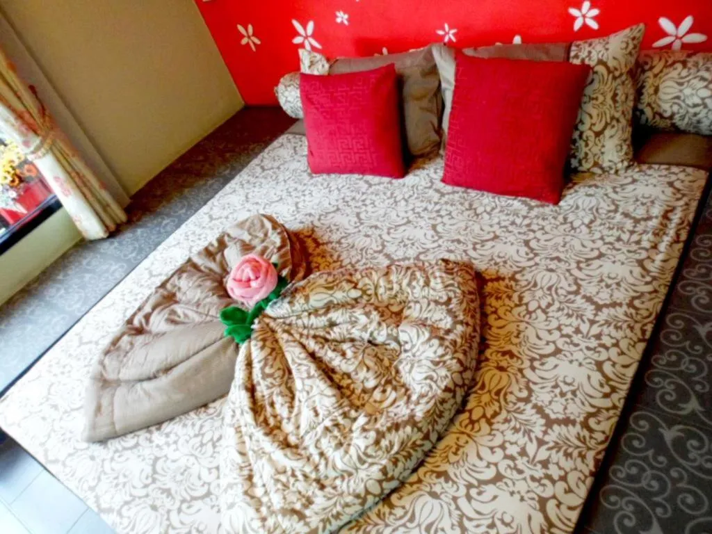 Bed in Sweet Garden Home Resort