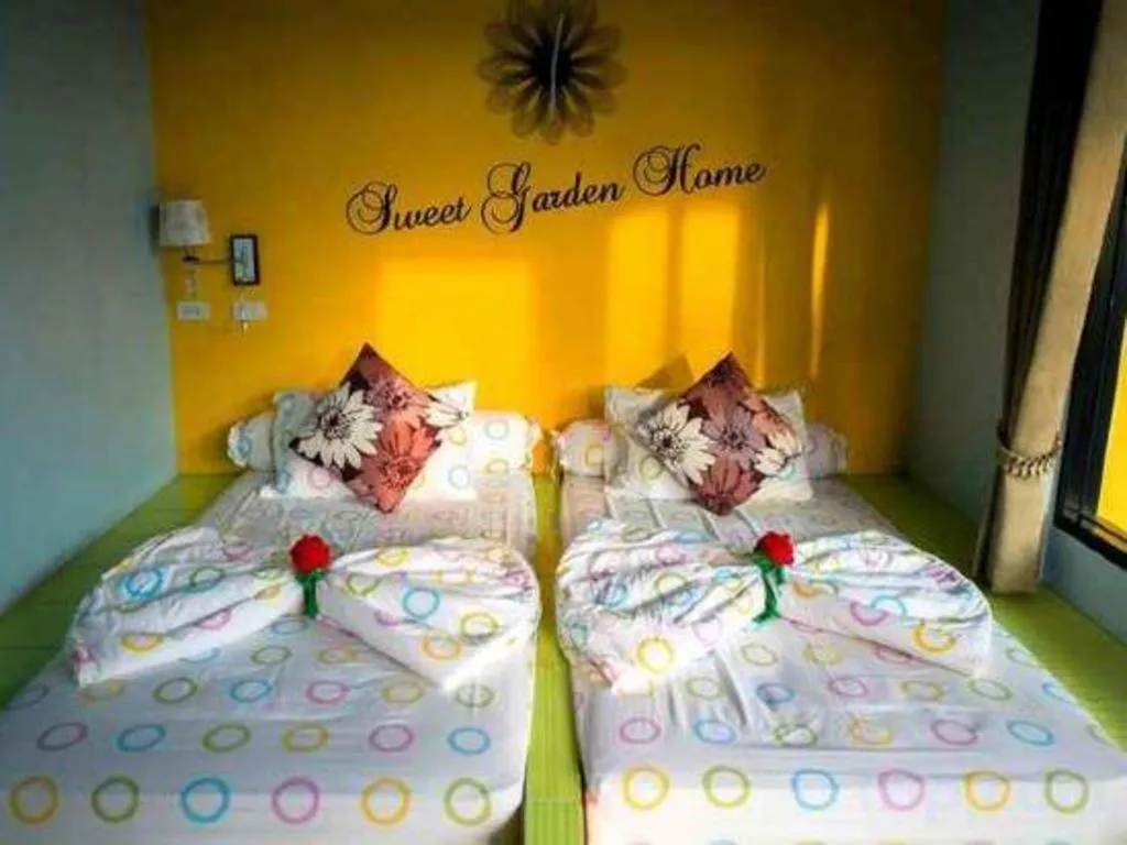 Bed in Sweet Garden Home Resort
