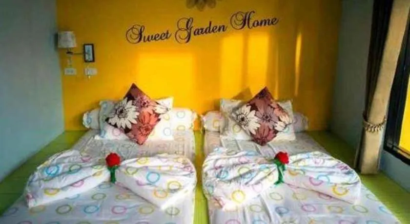 Bed in Sweet Garden Home Resort