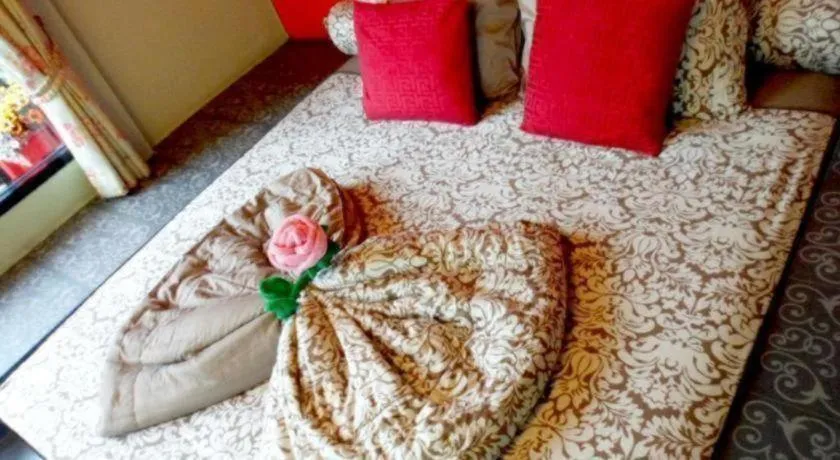 Bed in Sweet Garden Home Resort